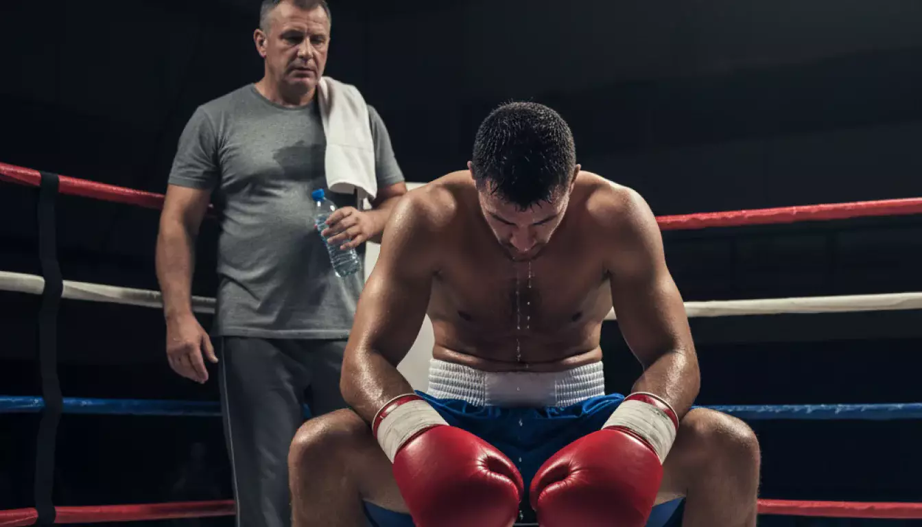 Boxer am Boden im Ring – typische Fehler bei Boxwetten vermeiden